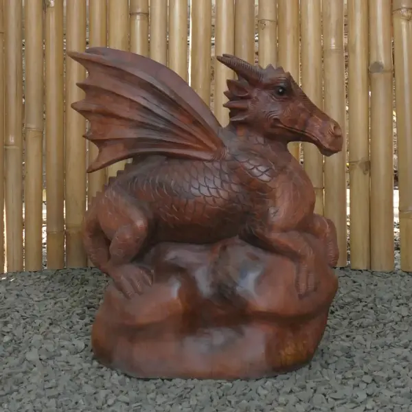 Product image 4 of the product “Dragon with leg lifted on the left made from suar wood, about 50cm Height ”